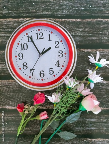 Wall clock and flower 