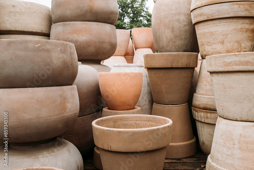 Ceramic terracotta flower pots in different sizes and shapes for sale at the garden center