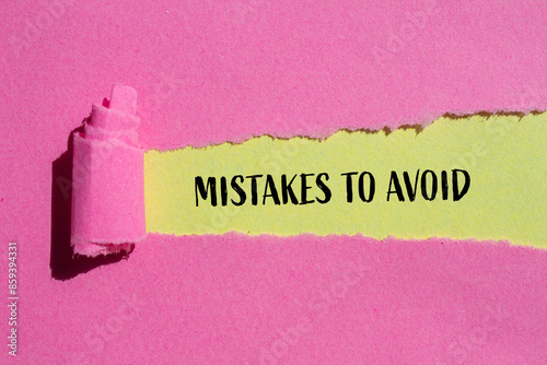 Mistakes to avoid message written on ripped pink paper with yellow background. Conceptual mistakes to avoid symbol. Copy space.