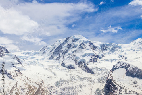 Magnificent panorama of the Pennine Alps with famous Gorner Glacier and impressive snow capped mountains Monte Rosa Massif close to Zermatt, Switzerland