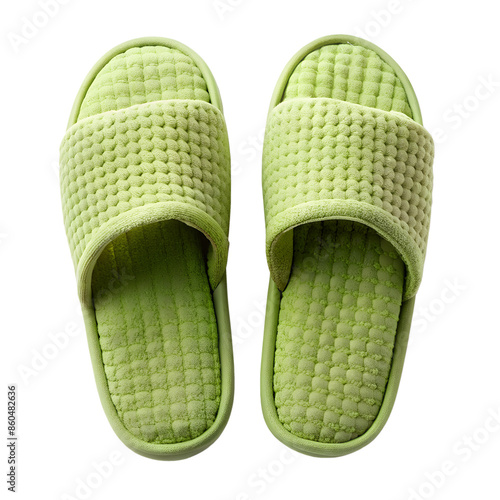 Top view of closed soft green home slippers isolated on background