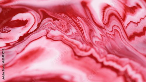 Acrylic fluid spill. Liquid marble texture. Blur white red color paint swirl mix layers ink drip pigment pour on shiny glitter surface abstract art background.