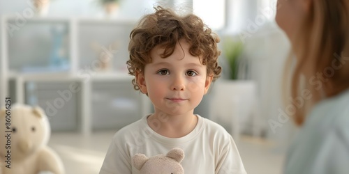Child holds animal flash card comforted by speech therapist in learning session. Concept Child Development, Therapy Techniques, Animal Flashcards, Learning Activities, Speech Pathology