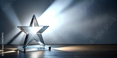 Star-shaped award made of glass on a white table with a spotlight on it and copy space