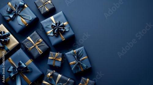 A festive arrangement of variously sized blue gifts on a blue background 