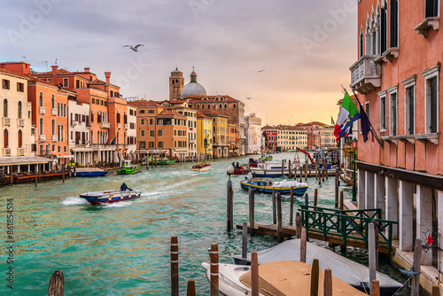 Morning in Venice. Cargo boats transport cargo through the canals of Venice