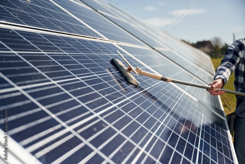 Close up view of cleaning solar panels surface