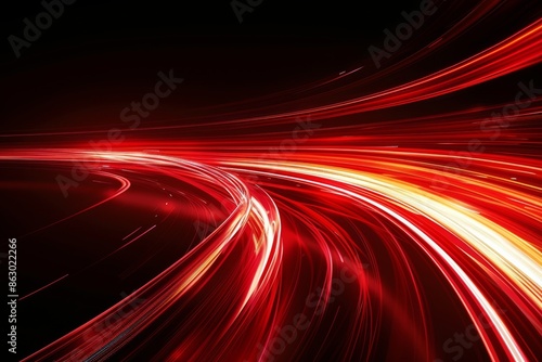 Abstract red lines depict the speed of the road in red. Red light trails on a dark background, with a high speed and fast motion blur effect.