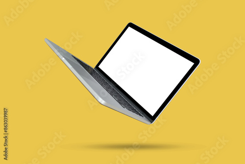Laptop with blank screen isolated on yellow background