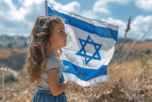 Little Jewish Patriot Girl with Israeli Flag on Blue Sky - Memorial Day, Yom Hazikaron, Yom Ha'atzmaut, Independence Day, Patriotic Holiday, Israel Concept