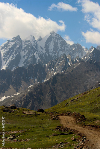 a beautiful road to great mountains of himalaya