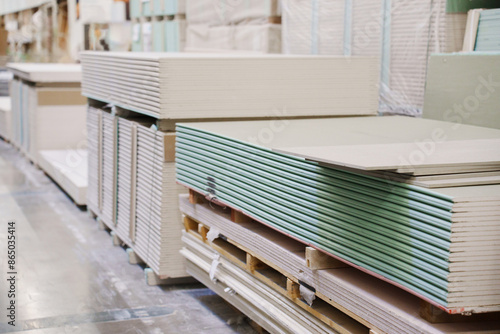  water repellent gypsum board on a rack in a hardware store. sale of building materials for repair and construction.