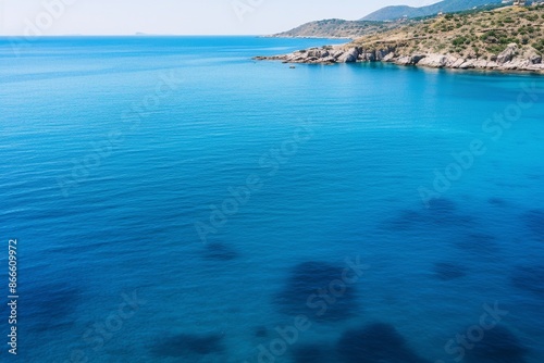 High angle shot of the ocean in different shades of blue in samos, greece