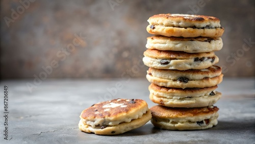 Stack of welsh cakes on off white and grey background, selective focus