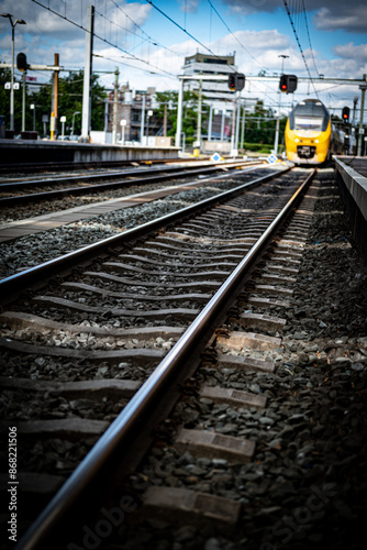 Train arrives at the railway station. 