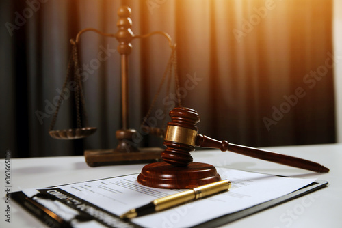 Law theme, gavel or mallet of the judge, lawyer enforcement officers, evidence-based cases taken into account in the court abount business, legislation.