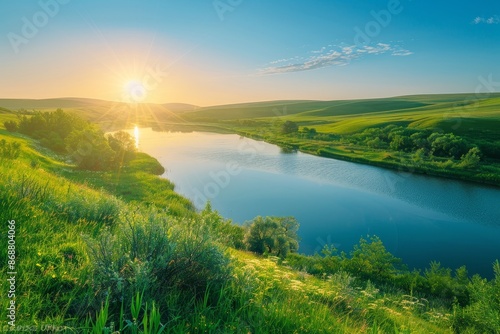 Sunny river landscape with green hills and fields in Tula Russia at sunrise