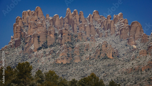 Snowy Montserrat mountains in winter, seen from El Bruc (Anoia, Barcelona, Catalonia, Spain)