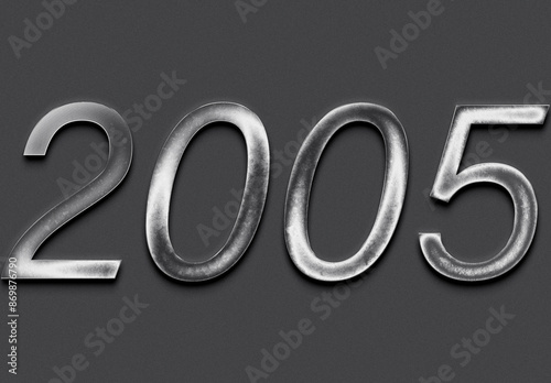 Chrome metal 3D number design of 2005 on grey background.