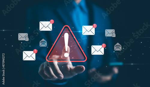 Email Security Warning Notification Concept. A businessman interacting with a digital screen showing email security alerts and warning notifications, cybersecurity threats. spam virus, junk mail, scam