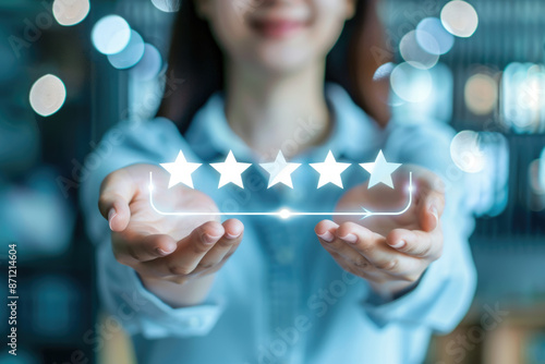 A woman is holding five stars in her hands, signifying a perfect five-star rating. This image represents exceptional customer service, positive feedback, and high satisfaction