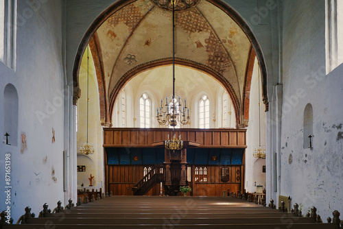 Interior of the medieval (12-15th century) protestant church of Holwierde (Stephanus Church or Stefanuskerk), with 15th-century oak rood screen. Province of Groningen, the Netherlands 