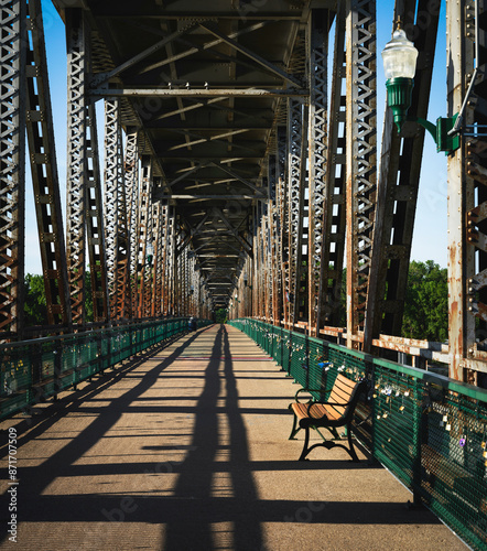 The Landmark Meridian Bridge with Bench across the Missouri River in Yankton: The double-deck bridge, opened in 1924, connecting Nebraska and South Dakota