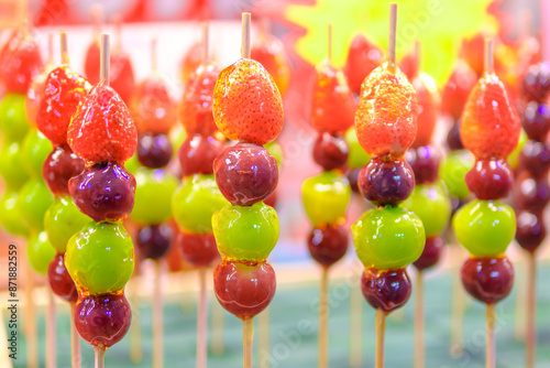 Beautifully arranged sugar-coated grape and strawberry. Tang Hu Lu