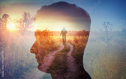 Man silhouette on rural landscape background. Psychiatry and psychology concept.