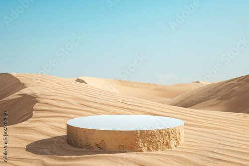 Round pedestal in a vast sandy desert under a clear blue sky, perfect for product display and presentations.