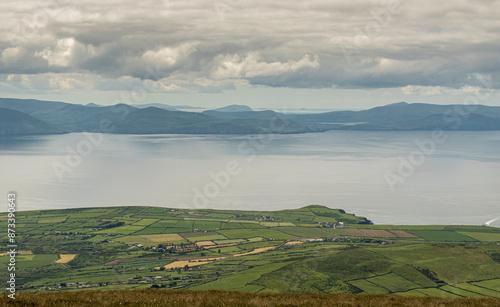 landscape with mountains water and clouds