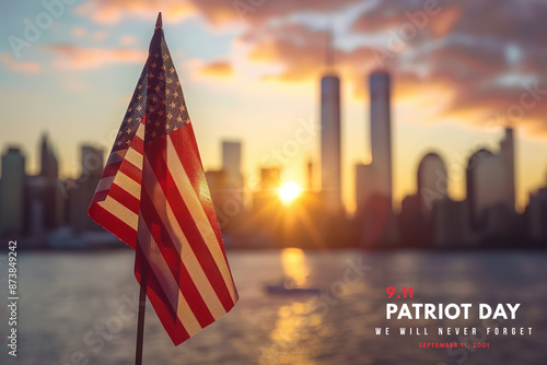 American flag at sunset with city skyline, Patriot Day tribute