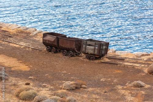 Old wagons in an abandoned mine on the island of Serifos. Cyclades, Greece