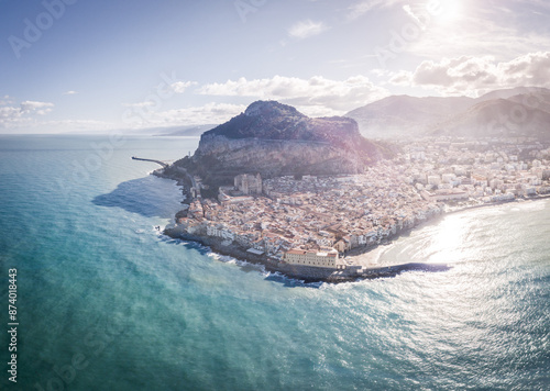 View from sea at Cefalu at a sunny day in Sicily Italy