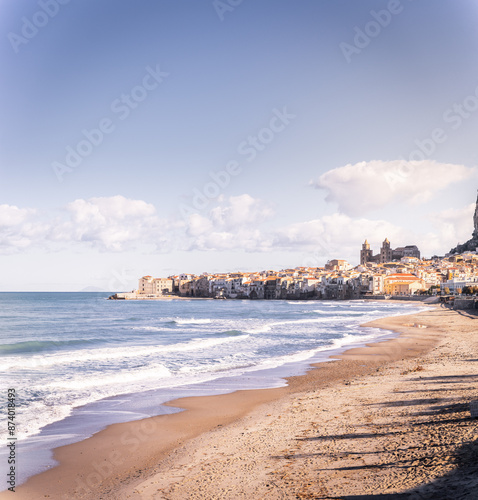 Beach at Cefalu at a sunny day in Sicily Italy