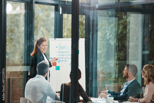 Woman, whiteboard and presentation with team in boardroom for goals, notes or planning with brainstorming. Coach, training and group with checklist, synergy or collaboration with strategy in office