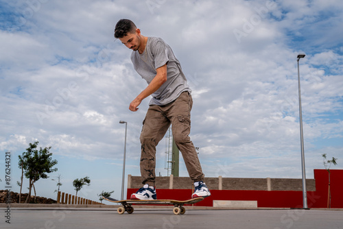 young man skating in a skate park