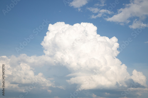 Cumulus rain clouds in a blue sky.Sky background with clouds.