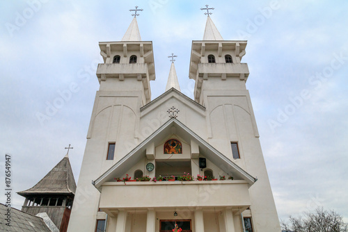 Europe, Romania. Maramures County, Baia Sprie. Roman Catholic church notable for its 3 steeples.