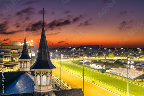 View of Churchill Downs race track in Louisville, Kentucky with a vibrant sunset sky