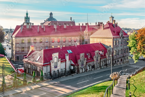 Lviv, Ukraine - November 2, 2023: Maksyma Kryvonosa Street comes alive on a crisp autumn morning. Close-up view of iconic Lviv fire station, a Romanesque gem crafted by Hohberger and Brunico in 1901