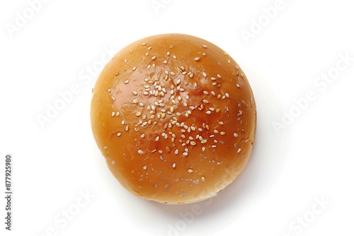 Closeup of a sesame seed hamburger bun on white background