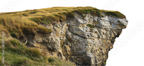 A steep cliff face with grass and rocks in ireland, cut out - stock png.