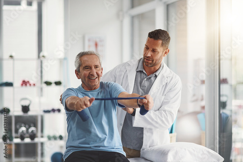 Physiotherapist, stretching band and senior patient for consulting, medical care and wellness. Orthopedic, healthcare and chiropractor with person for physical therapy, rehabilitation and exercise