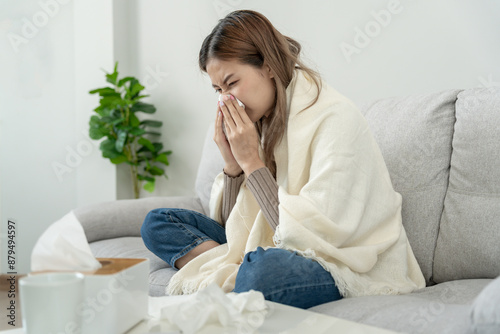 sick woman with a headache sitting under blanket, female sneezing and runny nose with seasonal influenza, allergic, high fever and influenza, resting, virus, coronavirus, feel illness, respiratory