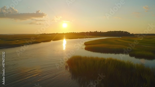 Sunset and golden hour light over The Salt water marsh and the sound behind Pawleys Island South Carolina : Generative AI