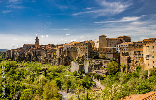 A glimpse of the ancient medieval village of Pitigliano, in the province of Grosseto, Tuscany, Italy. Is known as the little Jerusalem. The old stone houses built overlooking a spur of tuff rock.