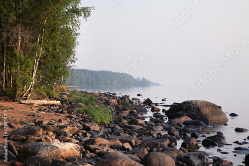 Misty dawn on Lake Onega. Russia