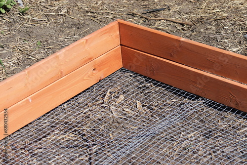 Raised bed made of impregnated wood.