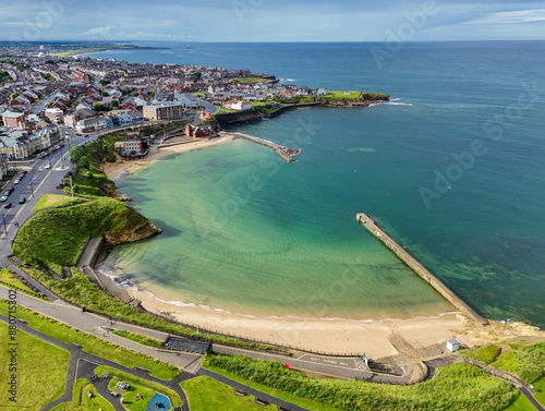 Aerial image of Cullercoats Bay along the North East Coast near Tynemouth, Northumberland. United Kingdom. 7th July 2024.